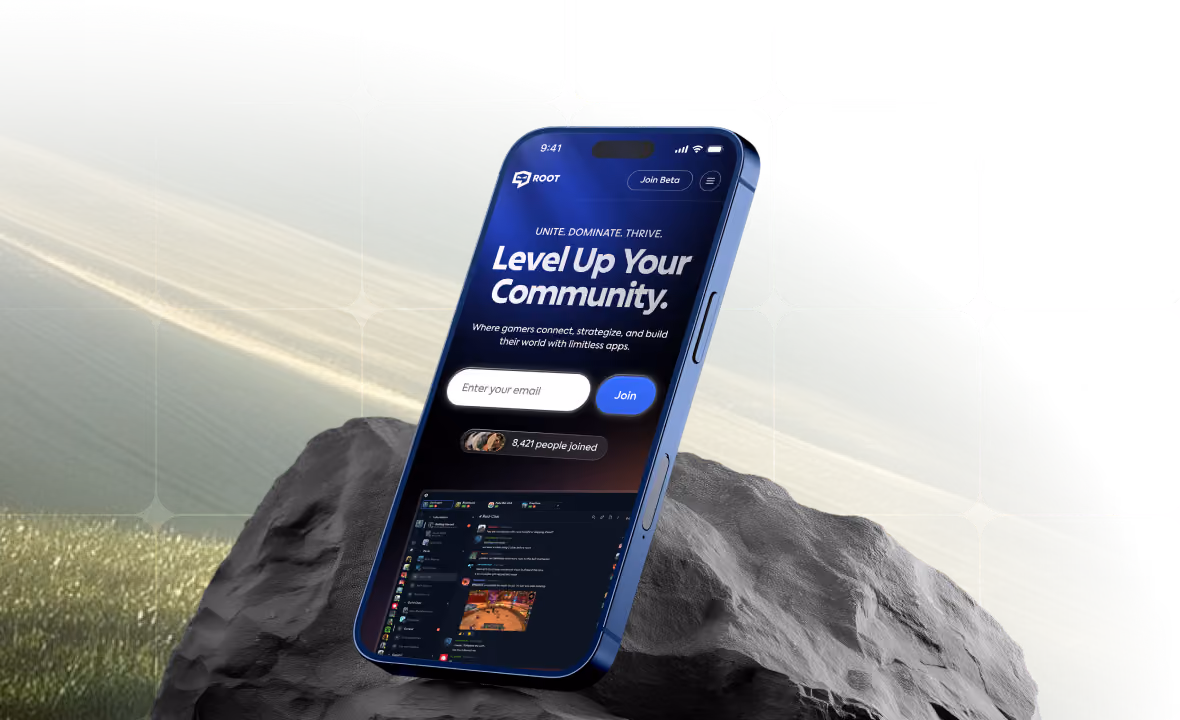 A phone showing a community app resting on a rock in a misty field.